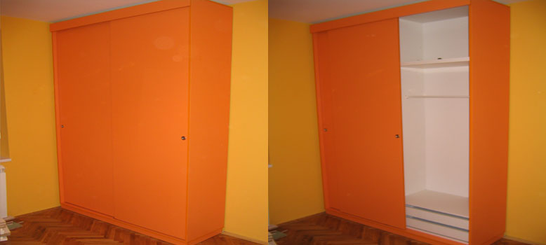 Sliding closet of MDF and orange chipboard